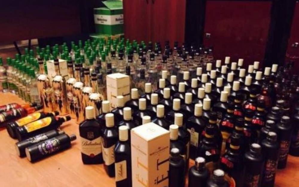 Saxta aksiz markalı külli miqdarda alkoqollu içki dövriyyədən çıxarılıb