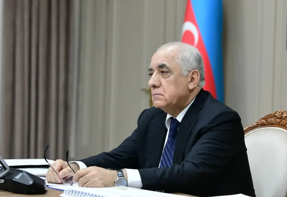 Əli Əsədov Oljas Bektenovu təbrik edib